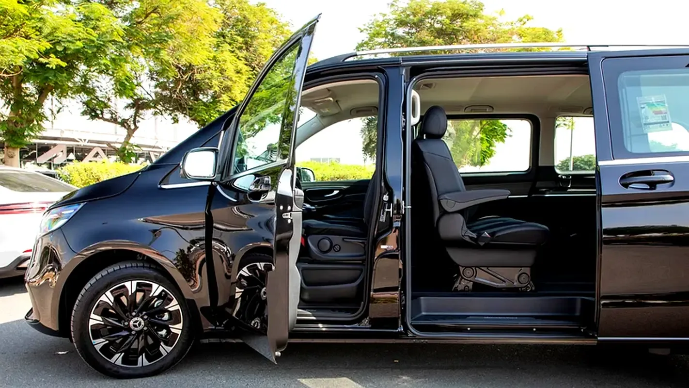 A V-Class with its sliding door open onto the captain's seats